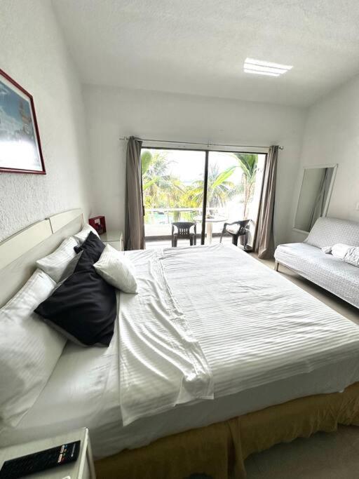 Spacious Two-story In Zone Location, Just 5 Minutes From Nightlife And Tourist Hotspots