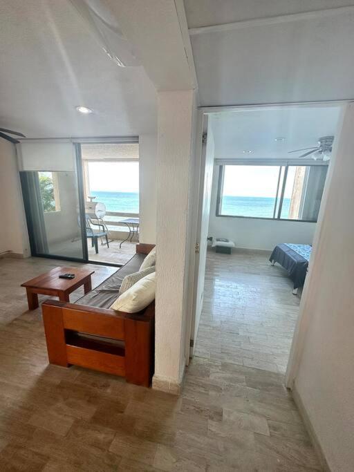 Escape To Serenity By The Sea! Beachfront With Pool, Just 5 Minutes From The Ferry Apartment